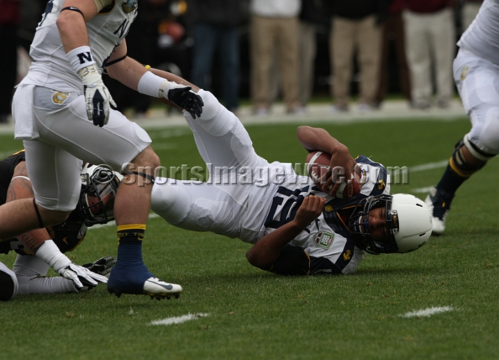 122912 Kraft SA-016.JPG - Dec 29, 2012; San Francisco, CA, USA; Navy Midshipmen quarterback Keenan Reynolds completes a run against the Arizona State Sun Devils in the 2012 Kraft Fighting Hunger Bowl at AT&T Park.